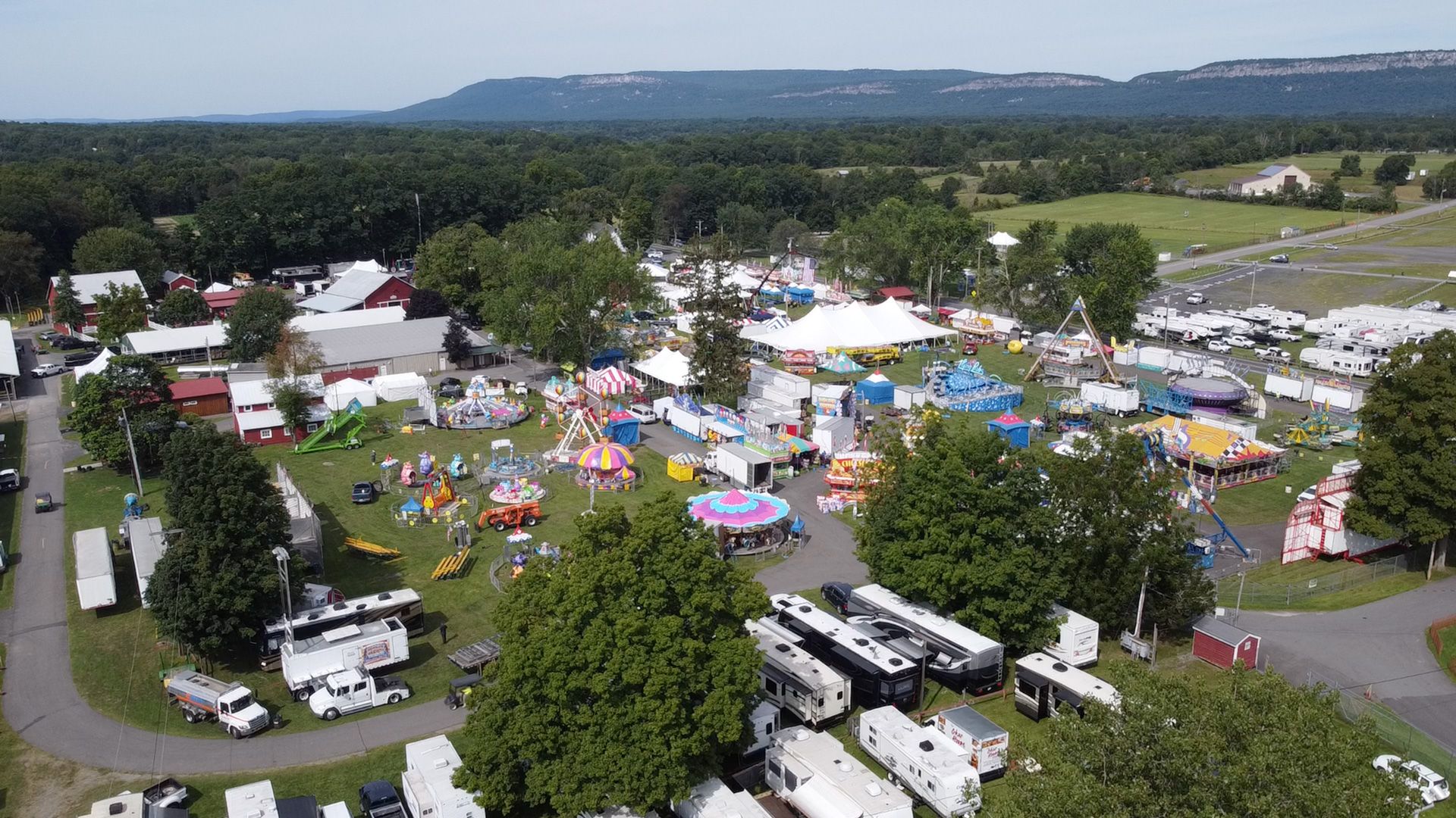 The Ulster County Fairgrounds from the air, with the Shawangunk ridge rising behind it.